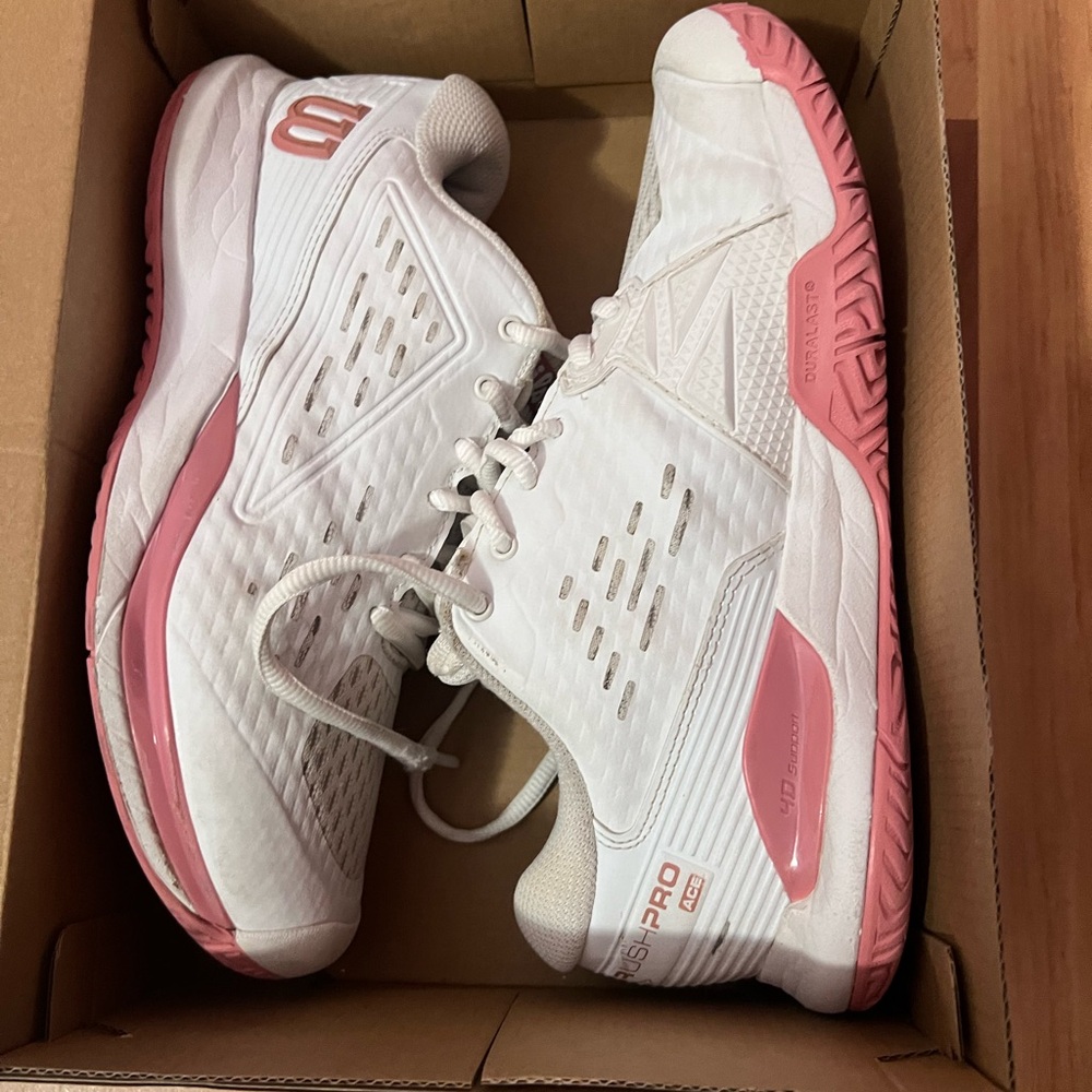 Wilson girl’s White and Pink Athletic Shoes
